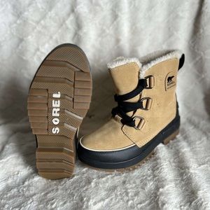 Beige black and white Sorel winter boots